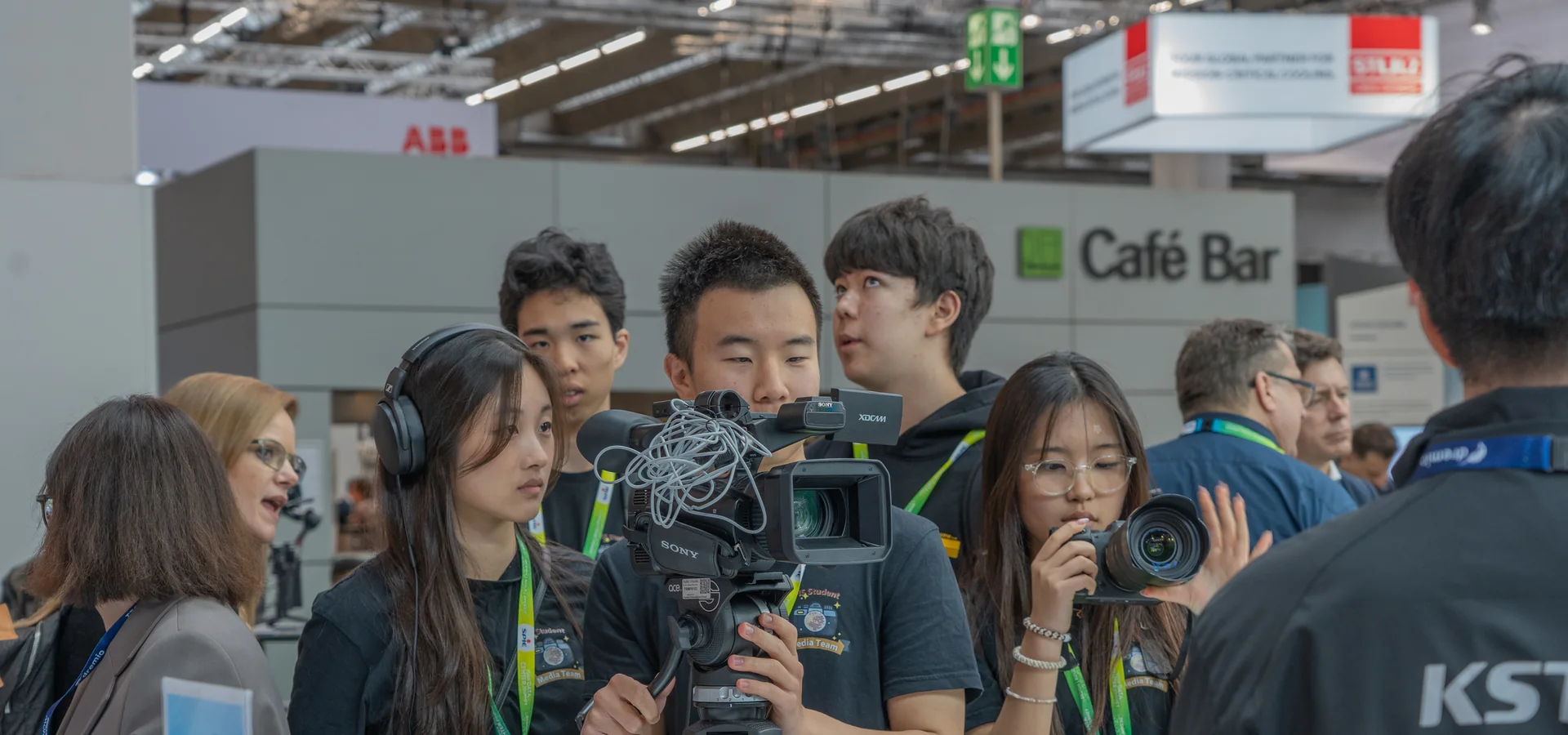FIS Media Club students operating video and still cameras at the Frankfurt Tech Show